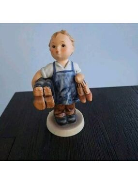 Goebel Figurine with Blue and White Details